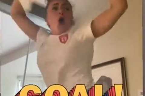 Watch jockey Megan Nicholls go crazy dancing in pub as she celebrates England beating Denmark in..