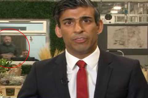 Good Morning Britain viewers distracted by man rubbing his bare BELLY in background of Rishi Sunak..