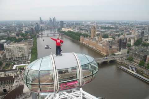 World Cup hero Sir Geoff Hurst stands atop the London Eye looking to Wembley as he dreams of..