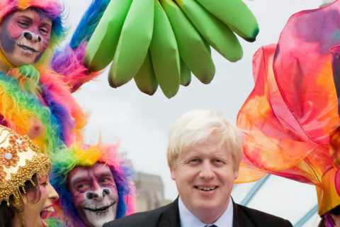 Boris Johnson left red-faced after snaps emerge of him posing with rainbow-coloured monkey with a..