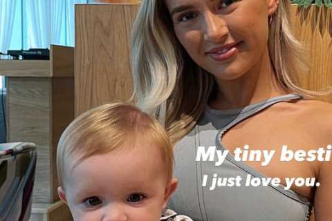 Molly-Mae Hague gets broody as she cuddles her pal’s baby – after saying she wants kids with Tommy..