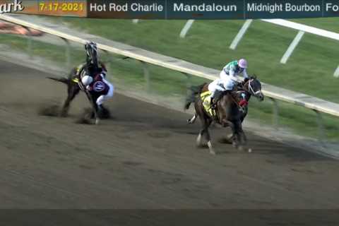 Watch crazy moment winning horse is disqualified and loses £438,000 after causing rival jockey to..
