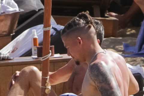 England heroes Kalvin Phillips and Ben White mess around in sea while enjoying well-earned holiday..