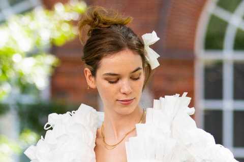 Designer creates wedding dress made entirely from dumped face-masks as restrictions are lifted