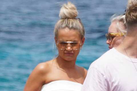 Molly-Mae Hague looks stunning in white minidress as she boards luxury superyacht in Ibiza
