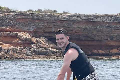 Euro 2020 hero Declan Rice rides jet ski and enjoys Ibiza summer holiday before heading back to..