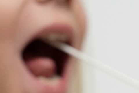 How do I report my Covid lateral flow test result and what happens if I test positive?