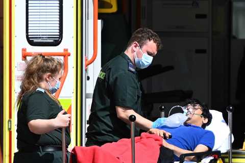 Half of Covid hospitalisations in England are patients who test positive after admission
