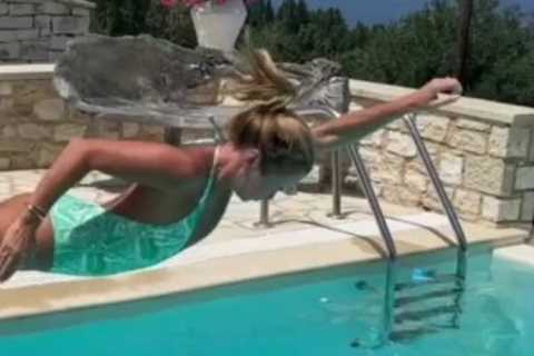 Amanda Holden strikes hilarious poses as she jumps in the pool from Mary Poppins to Superman