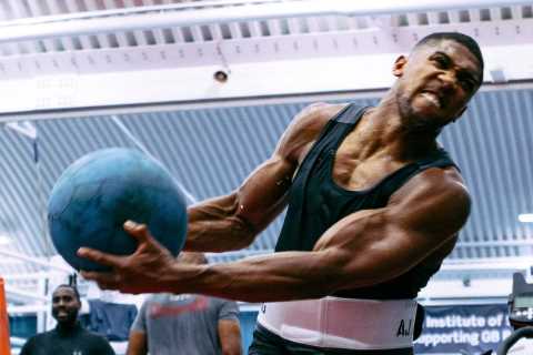 Watch Anthony Joshua show off immense power as Brit star DESTROYS medicine ball while training for..