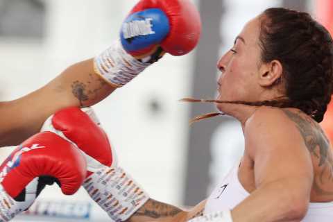 Ebanie Bridges catches the eye with Bec Connolly KO wearing fishnet tights in Eddie Hearn’s back..