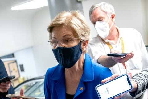 Elizabeth Warren plans to propose a minimum tax on the profits of the nation’s richest companies.