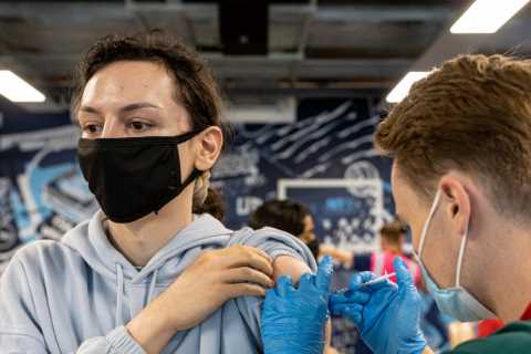 Young people will be given holiday vouchers to encourage them to get vaccinated