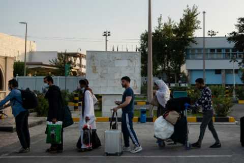Thousands of Afghans who helped the U.S. are trapped. What happens next?