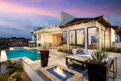Flip Or Flop’s Christina Haack buys $10.5M Orange County mansion with movie theater as she settles..