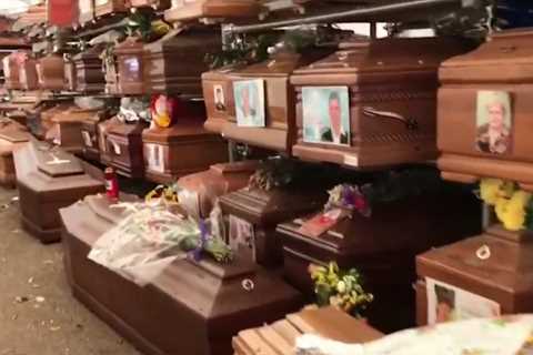 Covid health nightmare as 1,000 stinking ‘zombie coffins’ burst open after being left unburied in..