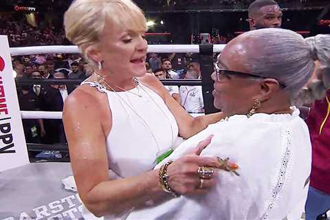 Touching moment Jake Paul and Tyron Woodley’s mums embrace in ring after their sons battle it out..