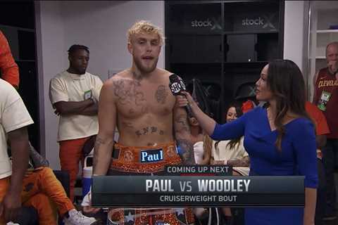 Jake Paul shows off ELECTRONIC shorts as UFC star Dustin Poirier visits YouTuber backstage before..