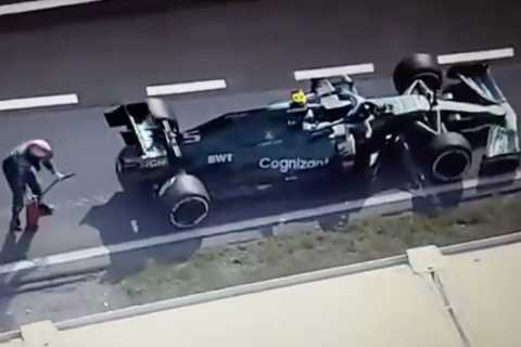 Watch F1 star Sebastian Vettel run to get fire extinguisher after smoke rises from his Aston Martin ..