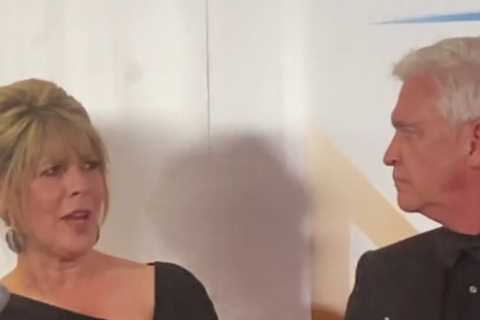 Ruth Langsford looks unimpressed as Phillip Schofield gives sweary NTAs speech after fans spotted..