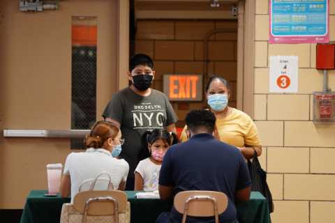 Biden calls on states to implement vaccine requirements in schools.