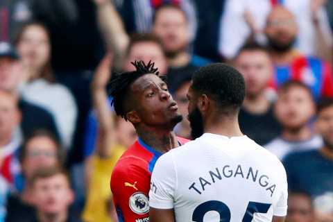 Furious Tottenham and Crystal Palace players clash in heated row after Tanganga CLATTERS Zaha to..