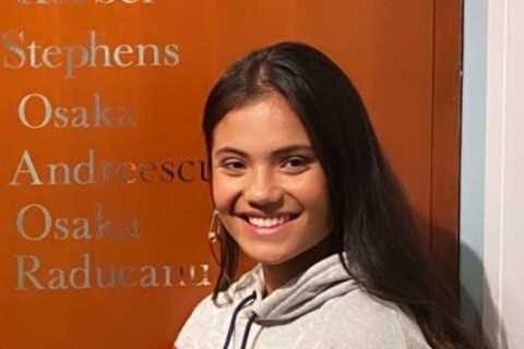Proud Emma Raducanu poses next to US Open champions wall after name is engraved below Serena..