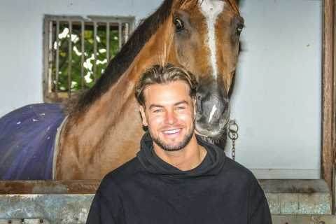 Love Island star Chris Hughes gets stuck in during National Racehorse Week