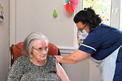 Pensioner, 85, becomes first UK care home resident to have Covid booster as government rolls out..