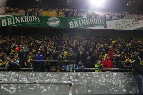 Football fans will be allowed to stand at top-flight games after 27-year ban