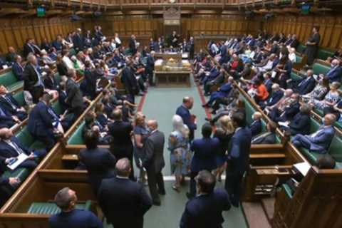 Why do MPs stand up in Parliament during PMQs