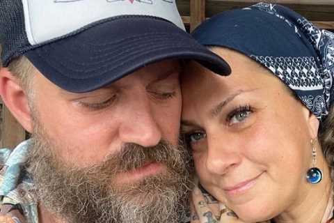 American Pickers star Danielle Colby cuddles up to fiance Jeremy Scheuch in rare photo of private..