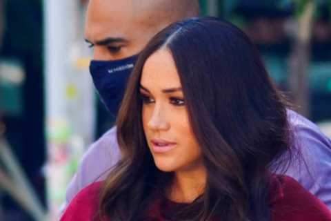 Meghan Markle hugs kids as she arrives to read her own picture book The Bench to them at Harlem..