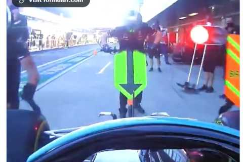 Lewis Hamilton sorry after wiping out mechanic as he misses his Mercedes box in Russian Grand Prix..