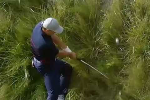 Watch Jordan Spieth pull off amazing chip shot from impossible position that nearly sees him fall..