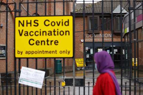 Covid pandemic will go on for another YEAR, says vaccine boss