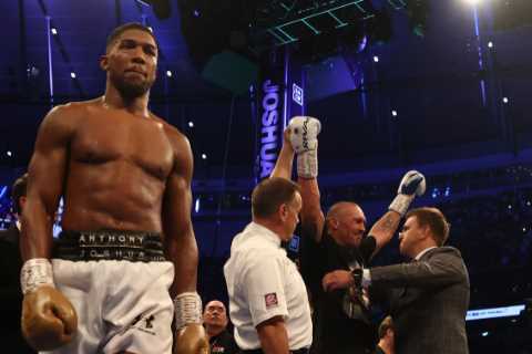Oleksandr Usyk breaks down in tears as he celebrates shock Anthony Joshua win and is congratulated..