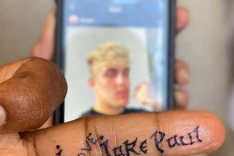 Woodley gets ‘I love Jake Paul’ tattoo on his middle finger and urges You Tube star to ‘come and..