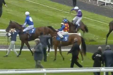 Champion jockey Oisin Murphy rushed to hospital with facial injury after horror paddock fall