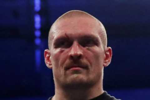 New champ Oleksandr Usyk back on school run with son Mikhail just days after masterclass victory..