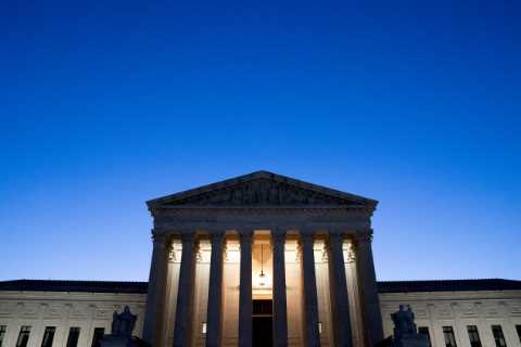 One Justice Missing and Only One Masked, the Supreme Court Returns