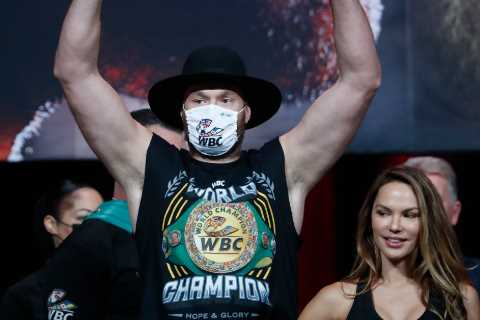 Tyson Fury weighs in almost THREE STONE heavier than Deontay Wilder for trilogy fight but pair are..