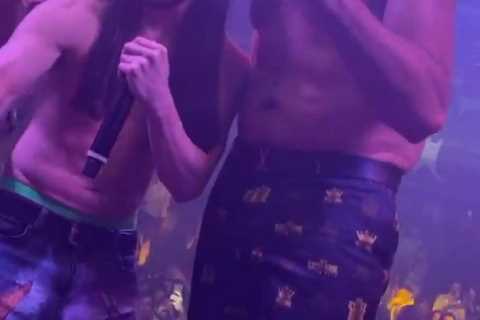 Tyson Fury and Tommy dance shirtless alongside Paris during wild party with Gypsy King singing..