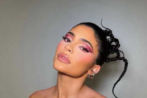 Pregnant Kylie Jenner almost slips out of top in new photo as fans speculate she’s expecting baby..