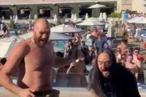 Tyson Fury parties by pool with wife Paris, brother Tommy and friends as he shows off scars of war..