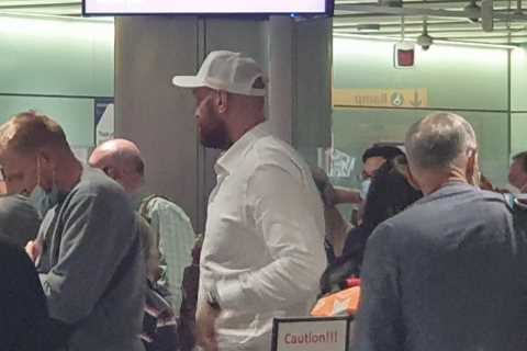 Tyson Fury yawns at passport control as he returns home and shows he’s people’s champ by queuing..