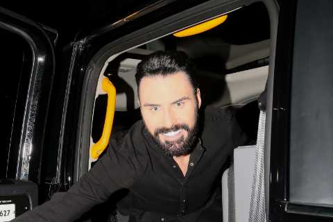 Rylan seen in high spirits as he hugs mystery man through car window after Strictly’s It Takes Two