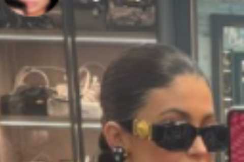 Pregnant Kylie Jenner shows off curves in a low-cut black dress after wearing compression wraps to..