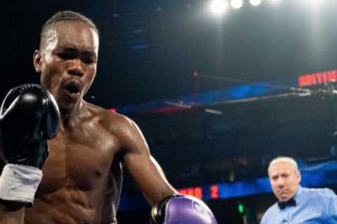 Watch as Evander Holyfield’s son Evan delivers monster KO cheered on by boxing legend ringside