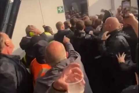 Tottenham and West Ham fans clash in ugly scenes at London Stadium after Spurs mob break through..